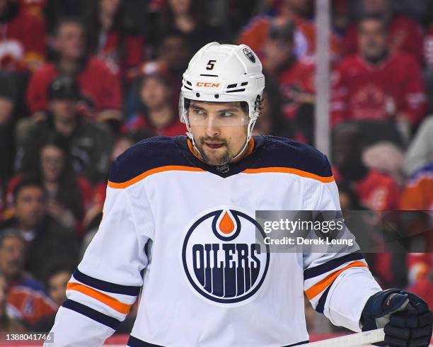 Cody Ceci of the Edmonton Oilers in action against the Calgary Flames during an NHL game at Scotiabank Saddledome on March 26 2022 in Calgary,...