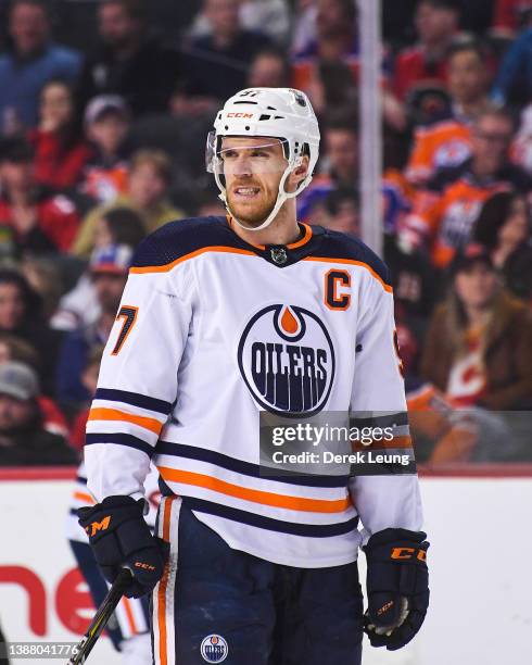 Connor McDavid of the Edmonton Oilers in action against the Calgary Flames during an NHL game at Scotiabank Saddledome on March 26 2022 in Calgary,...