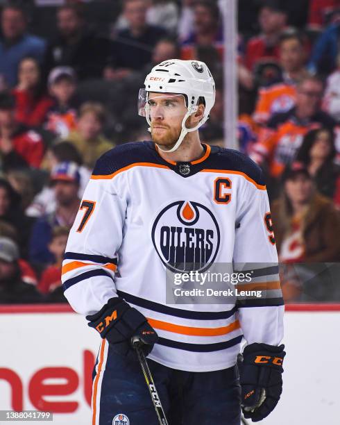 Connor McDavid of the Edmonton Oilers in action against the Calgary Flames during an NHL game at Scotiabank Saddledome on March 26 2022 in Calgary,...