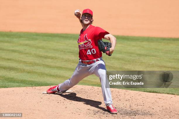 Jake Woodford of the St. Louis Cardinals throws a pitch during the fourth inning of the Spring Training game against the New York Mets at Clover Park...