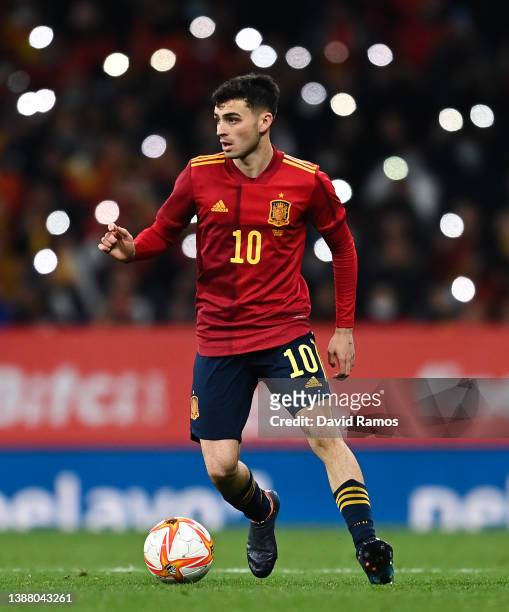 Pedri of Spain runs with the ball during the international friendly match between Spain and Albania at RCDE Stadium on March 26, 2022 in Barcelona,...