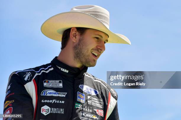 Todd Gilliland, driver of the Boot Barn Ford, walks onstage during driver intros prior to the NASCAR Cup Series Echopark Automotive Grand Prix at...