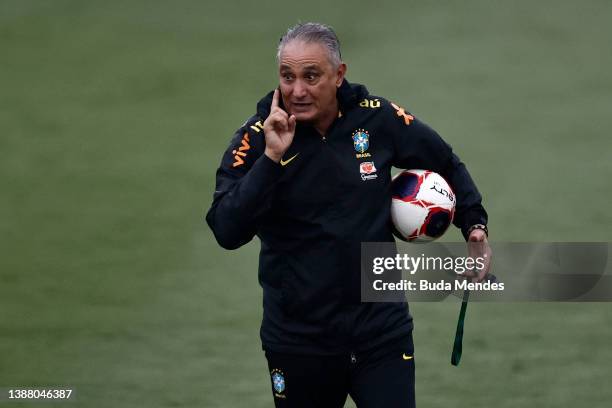 Head coach Tite gestures during a training session of the Brazilian national football team at the squad's Granja Comary training complex on March 27,...