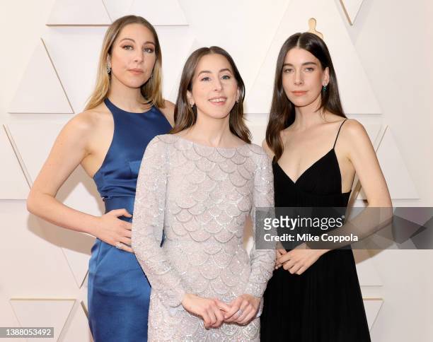 Este Haim, Alana Haim, and Danielle Haim attend the 94th Annual Academy Awards at Hollywood and Highland on March 27, 2022 in Hollywood, California.