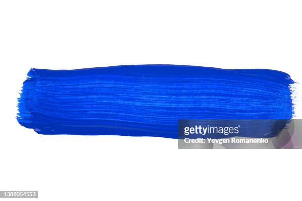 blue brush stroke isolated on white background - brushstroke stock-fotos und bilder