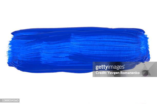 blue brush stroke isolated on white background - body color stock-fotos und bilder