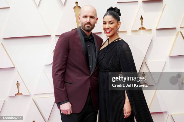 Brad Hoss and Stephanie Beatriz attend the 94th Annual Academy Awards at Hollywood and Highland on March 27, 2022 in Hollywood, California.