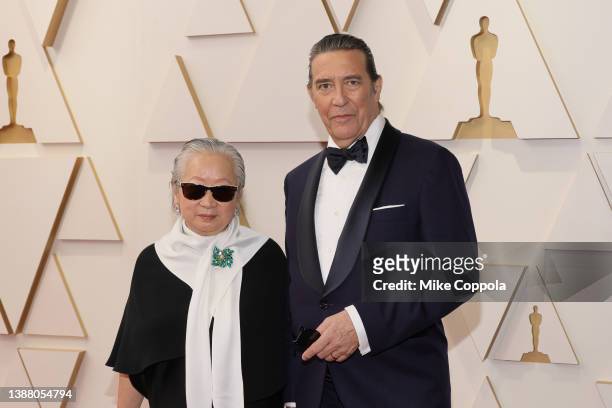 Hélène Patarot and Ciarán Hinds attend the 94th Annual Academy Awards at Hollywood and Highland on March 27, 2022 in Hollywood, California.