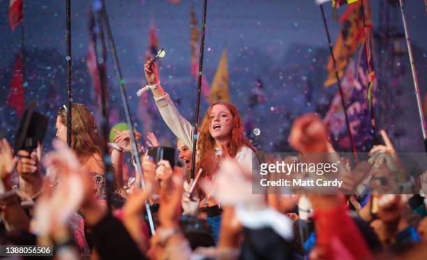 The crowd cheer as Coldplay perform during the 2016 Glastonbury Festival held at Worthy Farm, in Pilton near Glastonbury on June 26, 2016 in...