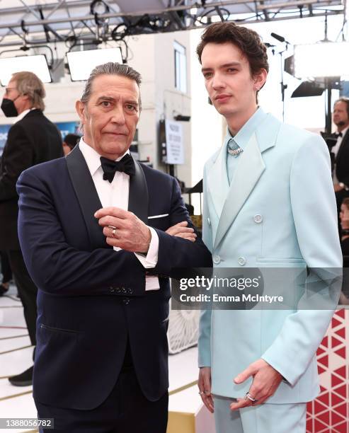 Ciarán Hinds and Kodi Smit-McPhee attend the 94th Annual Academy Awards at Hollywood and Highland on March 27, 2022 in Hollywood, California.