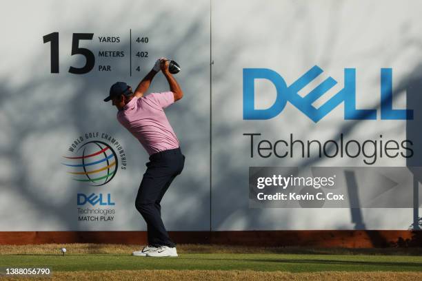 Scottie Scheffler of the United States plays his shot from the 15th tee in his finals match against Kevin Kisner of the United States on the final...