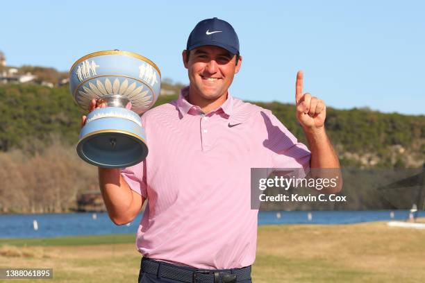 Scottie Scheffler of the United States poses with the Walter Hagen Cup after defeating Kevin Kisner of the United States 4&3 in their finals match to...