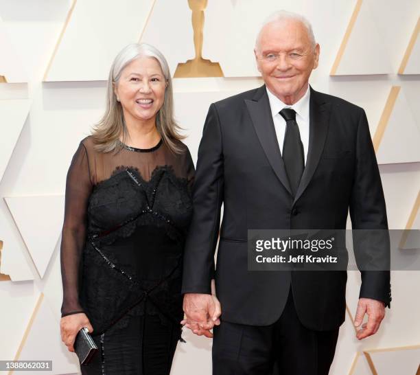Stella Arroyave and Anthony Hopkins attend the 94th Annual Academy Awards at Hollywood and Highland on March 27, 2022 in Hollywood, California.