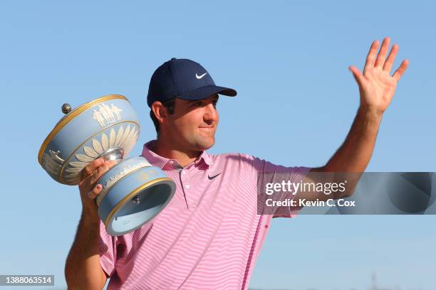 Scottie Scheffler of the United States poses with the Walter Hagen Cup after defeating Kevin Kisner of the United States 4&3 in their finals match to...