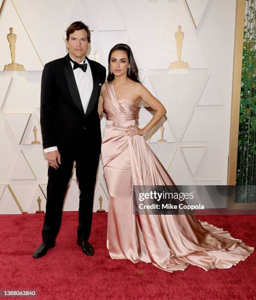 Ashton Kutcher and Mila Kunis attend the 94th Annual Academy Awards at Hollywood and Highland on March 27, 2022 in Hollywood, California.