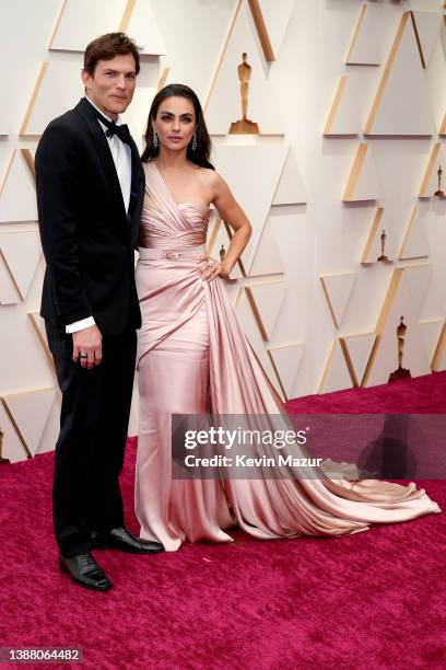 Ashton Kutcher and Mila Kunis attend the 94th Annual Academy Awards at Hollywood and Highland on March 27, 2022 in Hollywood, California.