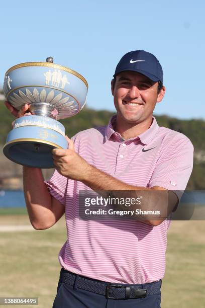 Scottie Scheffler of the United States poses with the Walter Hagen Cup after defeating Kevin Kisner of the United States 4&3 in their finals match to...