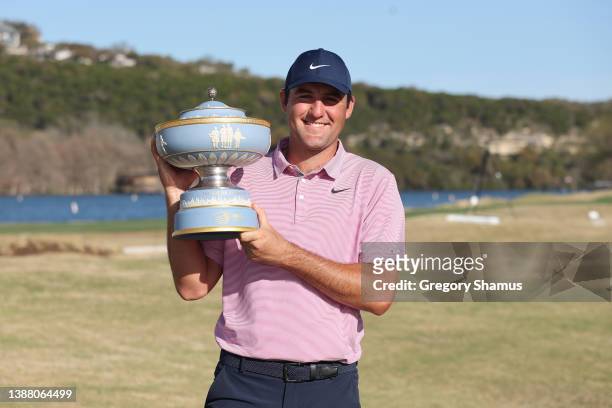 Scottie Scheffler of the United States poses with the Walter Hagen Cup after defeating Kevin Kisner of the United States 4&3 in their finals match to...