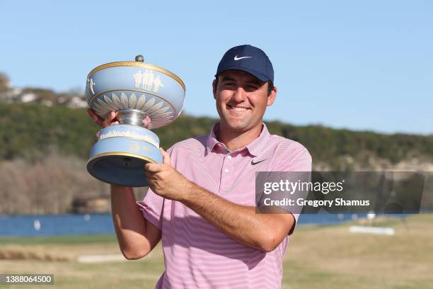 Scottie Scheffler of the United States poses with the Walter Hagen Cup after defeating Kevin Kisner of the United States 4&3 in their finals match to...