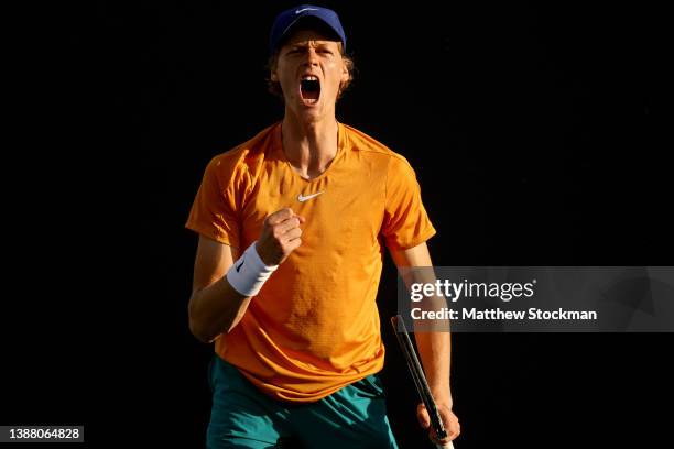 Jannik Sinner of Italy celebrates while playing Pablo Carreno Busta of Spain during the Miami Open at Hard Rock Stadium on March 27, 2022 in Miami...