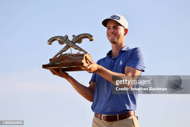 Trevor Werbylo poses with the trophy after winning the Lake Charles Championship at Country Club at Golden Nugget on March 27, 2022 in Lake Charles,...