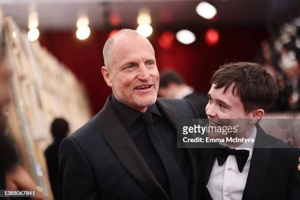 Woody Harrelson and Elliot Page attend the 94th Annual Academy Awards at Hollywood and Highland on March 27, 2022 in Hollywood, California.