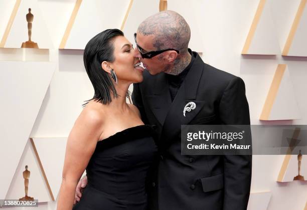 Kourtney Kardashian and Travis Barker attend the 94th Annual Academy Awards at Hollywood and Highland on March 27, 2022 in Hollywood, California.