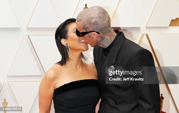 Kourtney Kardashian and Travis Barker attend the 94th Annual Academy Awards at Hollywood and Highland on March 27, 2022 in Hollywood, California.