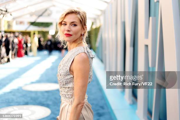Sienna Miller attends the 2022 Vanity Fair Oscar Party hosted by Radhika Jones at Wallis Annenberg Center for the Performing Arts on March 27, 2022...