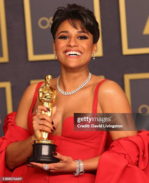 Actress Ariana DeBose poses with her Oscar for Best Supporting Actress for 'West Side Story' in the press room at the 94th Annual Academy Awards at...