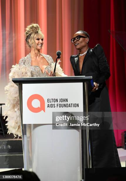 Heidi Klum and Billy Porter speak onstage during the Elton John AIDS Foundation's 30th Annual Academy Awards Viewing Party on March 27, 2022 in West...