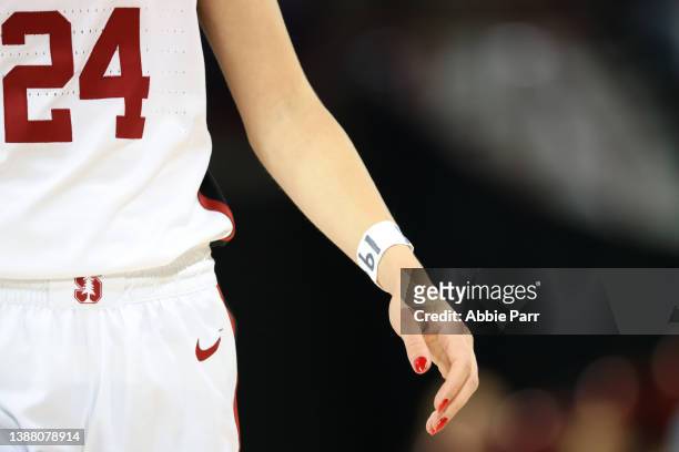 Lacie Hull of the Stanford Cardinal wears the number 19 on her wrist in honor of Stanford women's soccer player Katie Meyer during the first half...