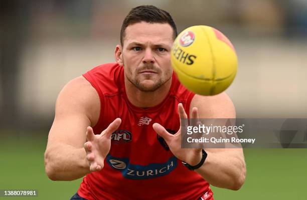 Steven May of the Demons marks during a Melbourne Demons AFL training session at Gosch's Paddock on March 28, 2022 in Melbourne, Australia.