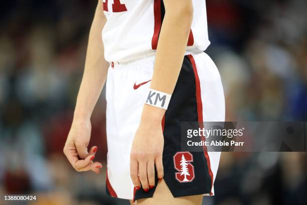 Lacie Hull of the Stanford Cardinal wears the letters KM on her wrist in honor of Stanford women's soccer player Katie Meyer during the first half...