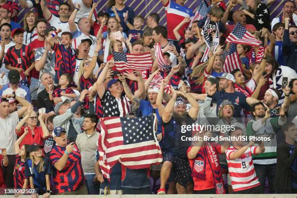 Fans celebrate a goal during a FIFA World Cup qualifier game between Panama and USMNT at Exploria Stadium on March 27, 2022 in Orlando, Florida.