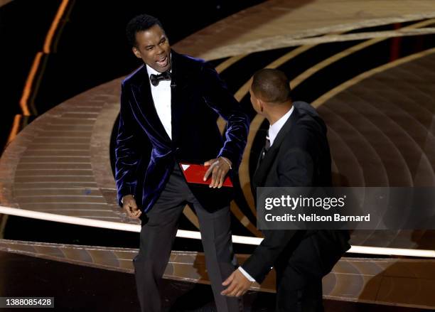 Will Smith appears to slap Chris Rock onstage during the 94th Annual Academy Awards at Dolby Theatre on March 27, 2022 in Hollywood, California.