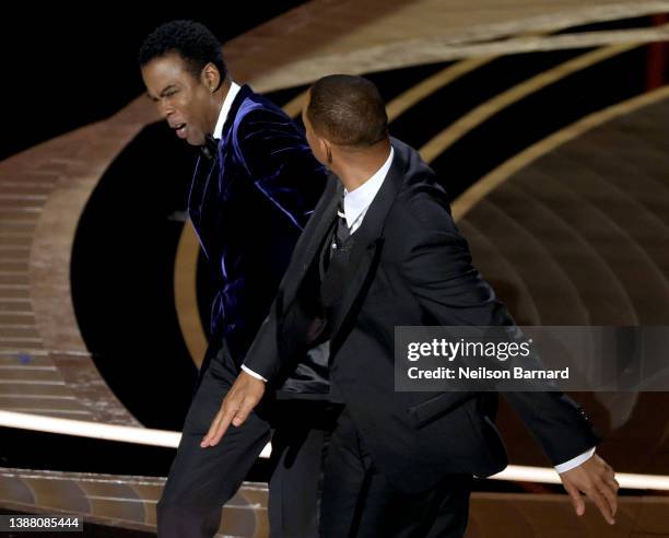 Will Smith appears to slap Chris Rock onstage during the 94th Annual Academy Awards at Dolby Theatre on March 27, 2022 in Hollywood, California.