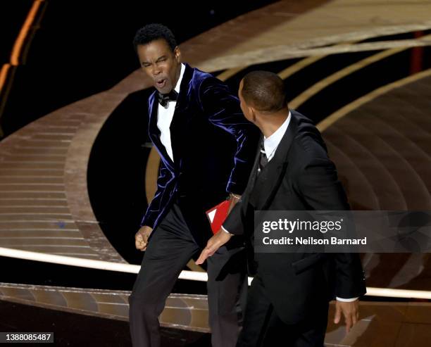 Will Smith appears to slap Chris Rock onstage during the 94th Annual Academy Awards at Dolby Theatre on March 27, 2022 in Hollywood, California.