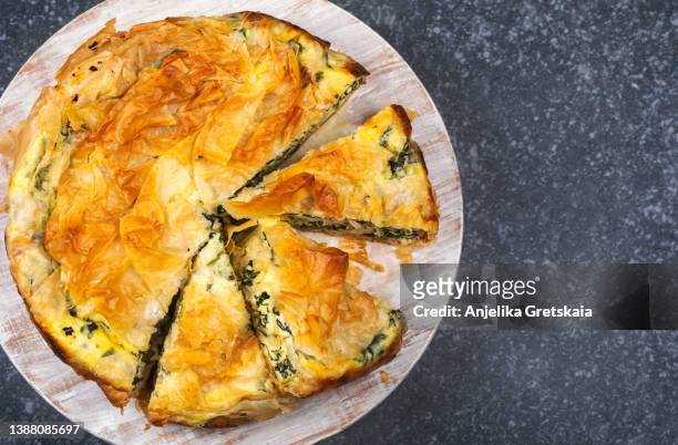 spinach feta cheese pie. greek pie spanakopita. - spinach pie stock pictures, royalty-free photos & images