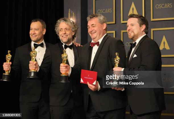 Tristan Myles, Brian Connor, Paul Lambert, Gerd Nefzer, winners of the Visual Effects award for ‘Dune’ pose in the press room during the 94th Annual...