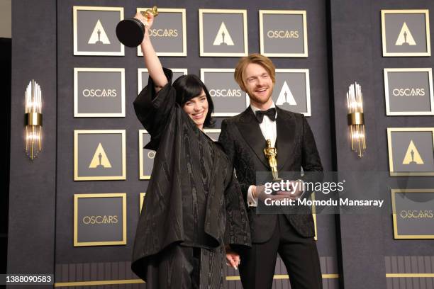 American singer-songwriters Billie Eilish and FINNEAS, winners of the Oscar for Original Song for “No Time To Die” from “No Time to Die", pose in the...