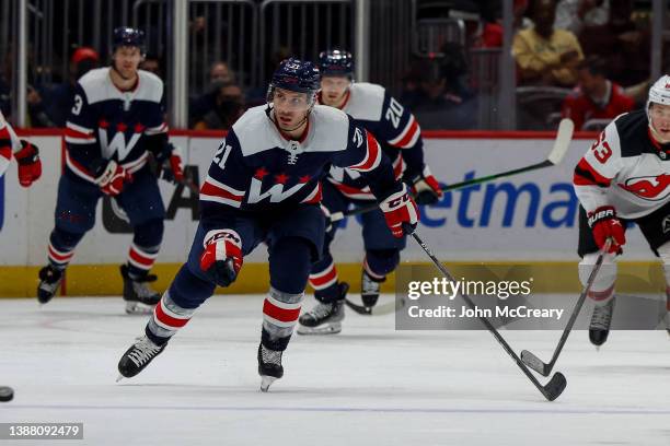 Garnet Hathaway of the Washington Capitals skates up the ice during a game against the New Jersey Devils at Capital One Arena on March 26, 2022 in...