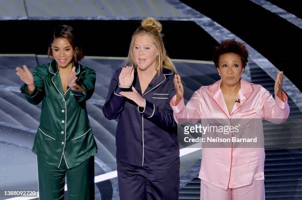 Co-hosts Regina Hall, Amy Schumer, and Wanda Sykes speak onstage during the 94th Annual Academy Awards at Dolby Theatre on March 27, 2022 in...