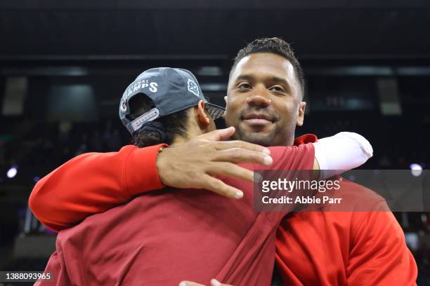 Quarterback Russell Wilson hugs his sister Anna Wilson of the Stanford Cardinal after defeating the Texas Longhorns 59-50 in the NCAA Women's...