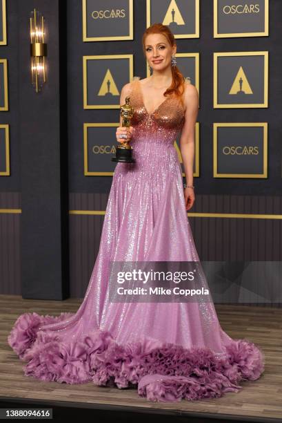 Jessica Chastain, winner of the Actress in a Leading Role award for ‘The Eyes of Tammy Faye’ poses in the press room during the 94th Annual Academy...