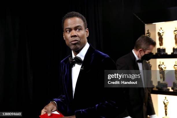 In this handout photo provided by A.M.P.A.S., Chris Rock is seen backstage during the 94th Annual Academy Awards at Dolby Theatre on March 27, 2022...