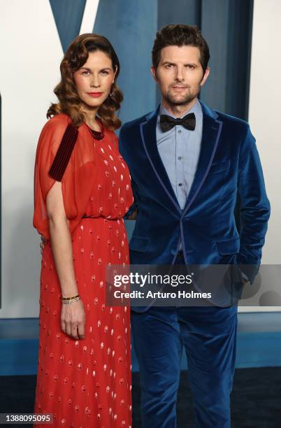 Naomi Sablan and Adam Scott attend the 2022 Vanity Fair Oscar Party hosted by Radhika Jones at Wallis Annenberg Center for the Performing Arts on...