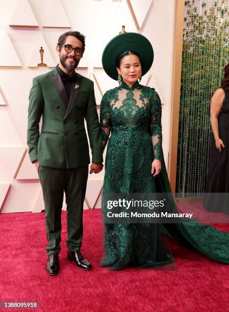 Guest and Kelly Marie Tran attend the 94th Annual Academy Awards at Hollywood and Highland on March 27, 2022 in Hollywood, California.