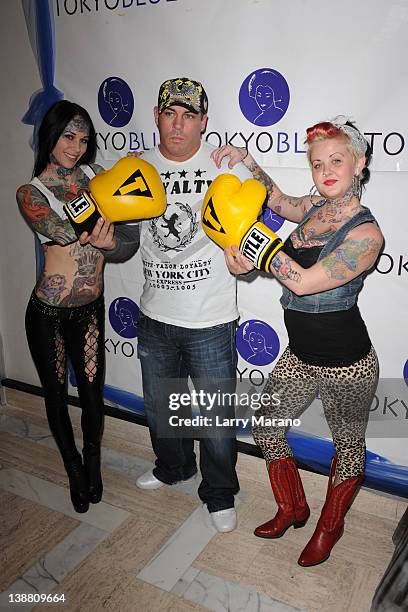 Michelle Bombshell McGee, Damon Feldman and Smash pose prior too a celebrity boxing match presented by Damon Feldman on February 11, 2012 in Fort...