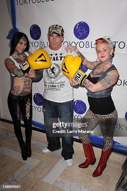 Michelle Bombshell McGee, Damon Feldman and Smash pose prior too a celebrity boxing match presented by Damon Feldman on February 11, 2012 in Fort...